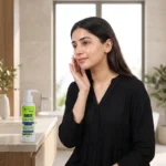 Pakistani woman applying Dispenso Naturals Hydra Glow Moisturizer to her face